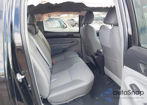 2015 Toyota Tacoma Base V6 z USA, uszkodzony, nr VIN 3TMLU4ENXFM201312